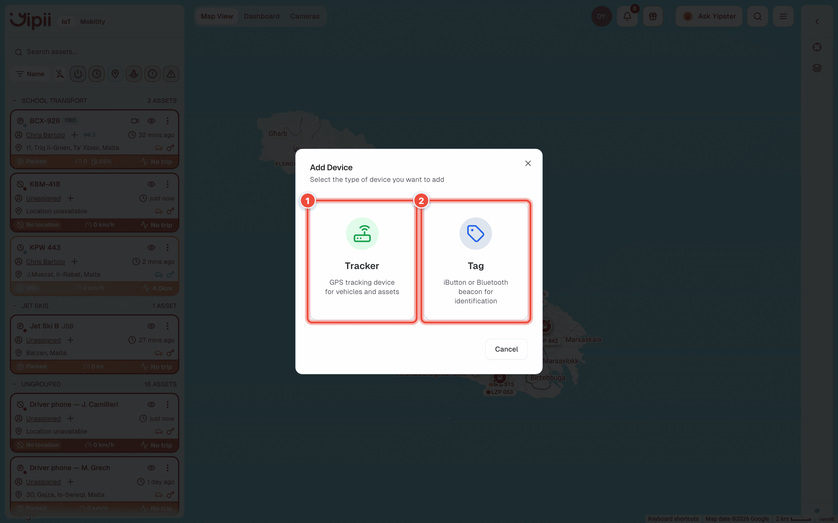 The Add Device dialog with the Tracker card (1) and the Tag card (2) highlighted